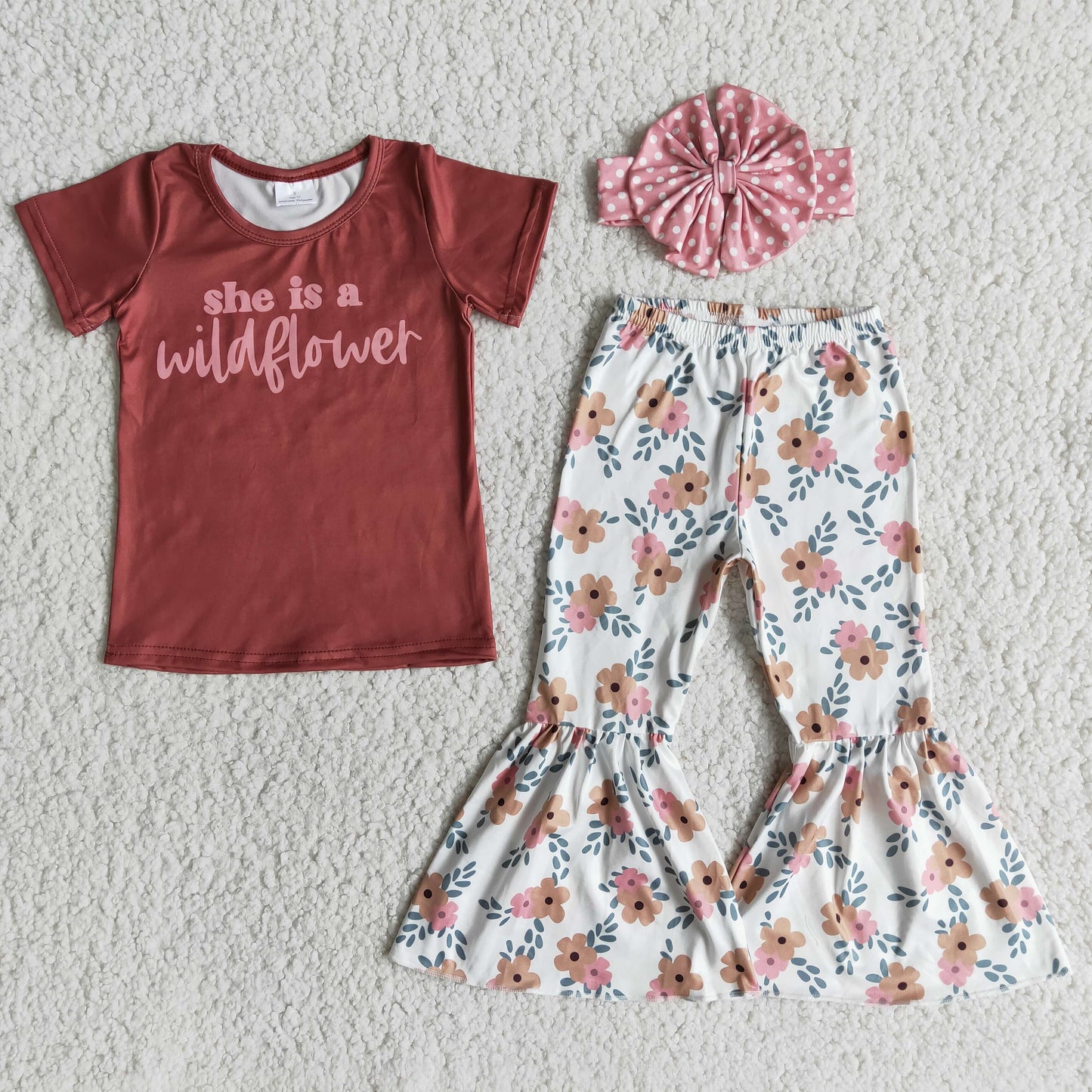she is a wildflowers Boutique girl outfits with bow