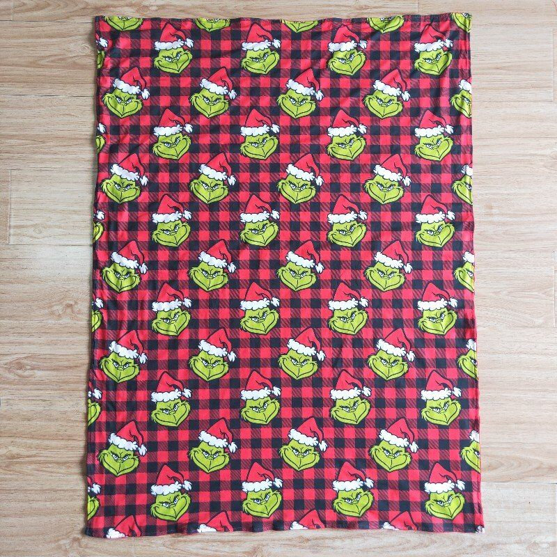 red grinch Kids’ Blankets